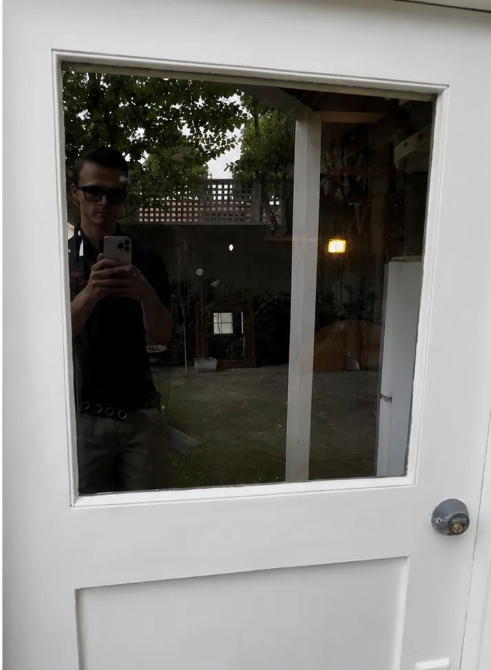 Clear residential door glass after professional cleaning by Golden View Windows
